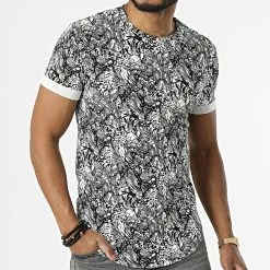 De gros 💯 Tee 👕 Shirt Oversize U1160 Blanc Noir Floral de Frilivin 💯 -Promos Frilivin Magasin frilivin 319206 U1160 20220518T144028 03